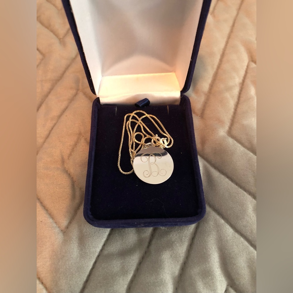Sterling silver chain & disc.